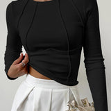 The Clair™ | Langærmet top med ribbet piping