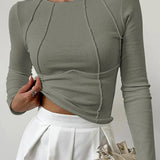 The Clair™ | Langærmet top med ribbet piping